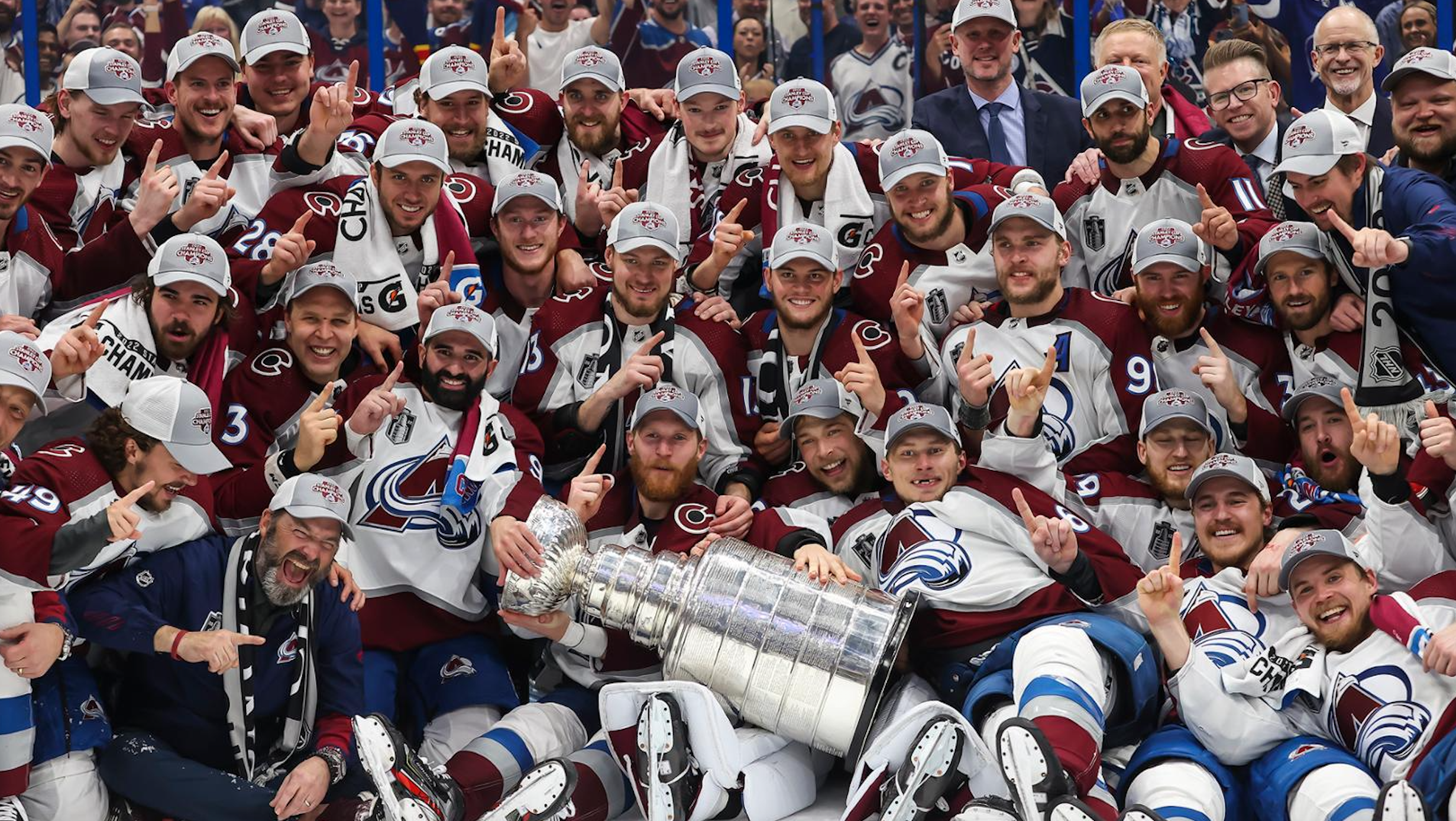 Colorado Avalanche players celebrating with the Stanley Cup