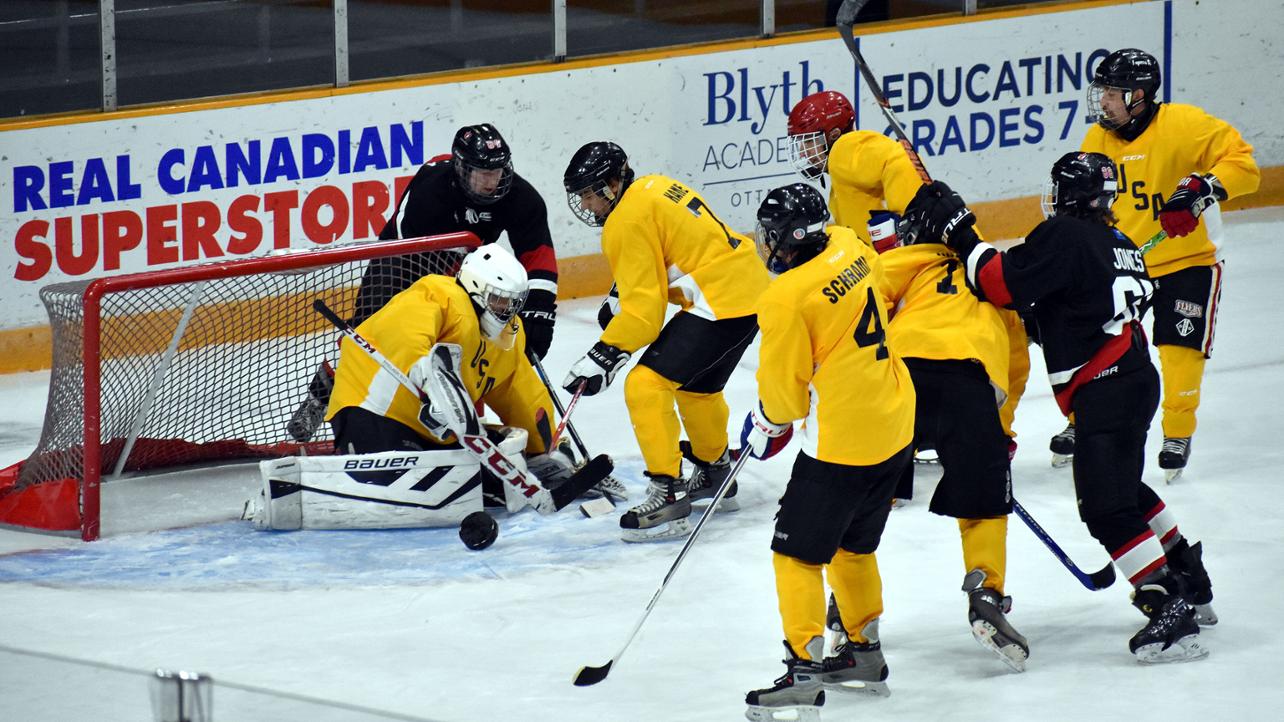 People playing blind hockey