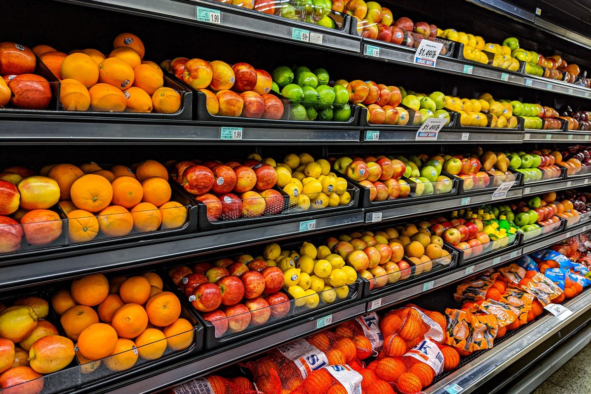 A grocery store display of fresh fruits