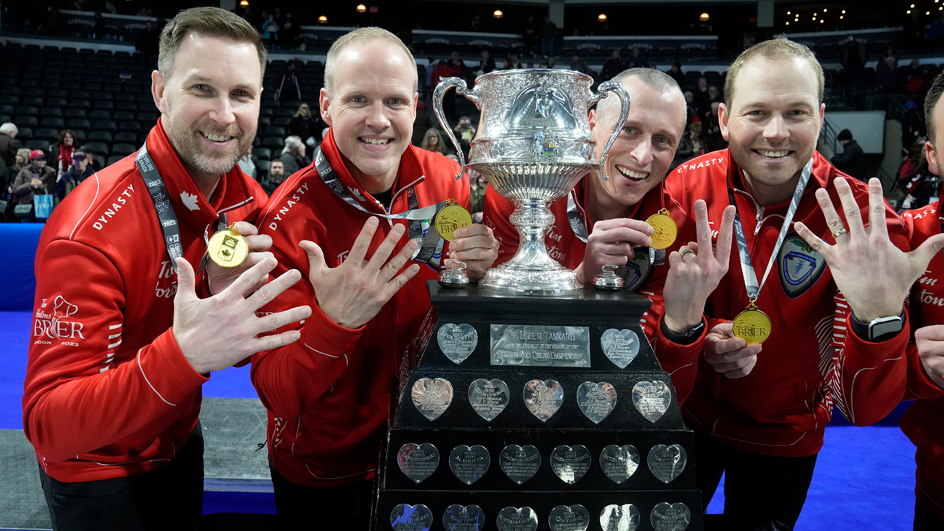 Brad Gushue's team celebrating their Brier win