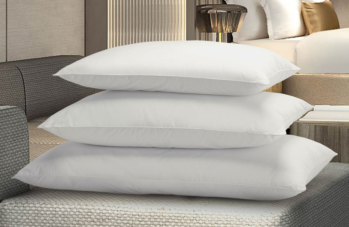 Multiple pillows on a bed