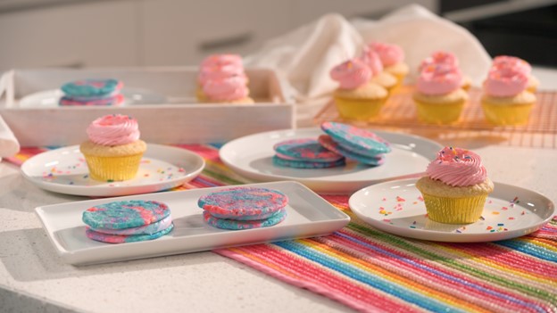 Colourful cookies and cupcakes.